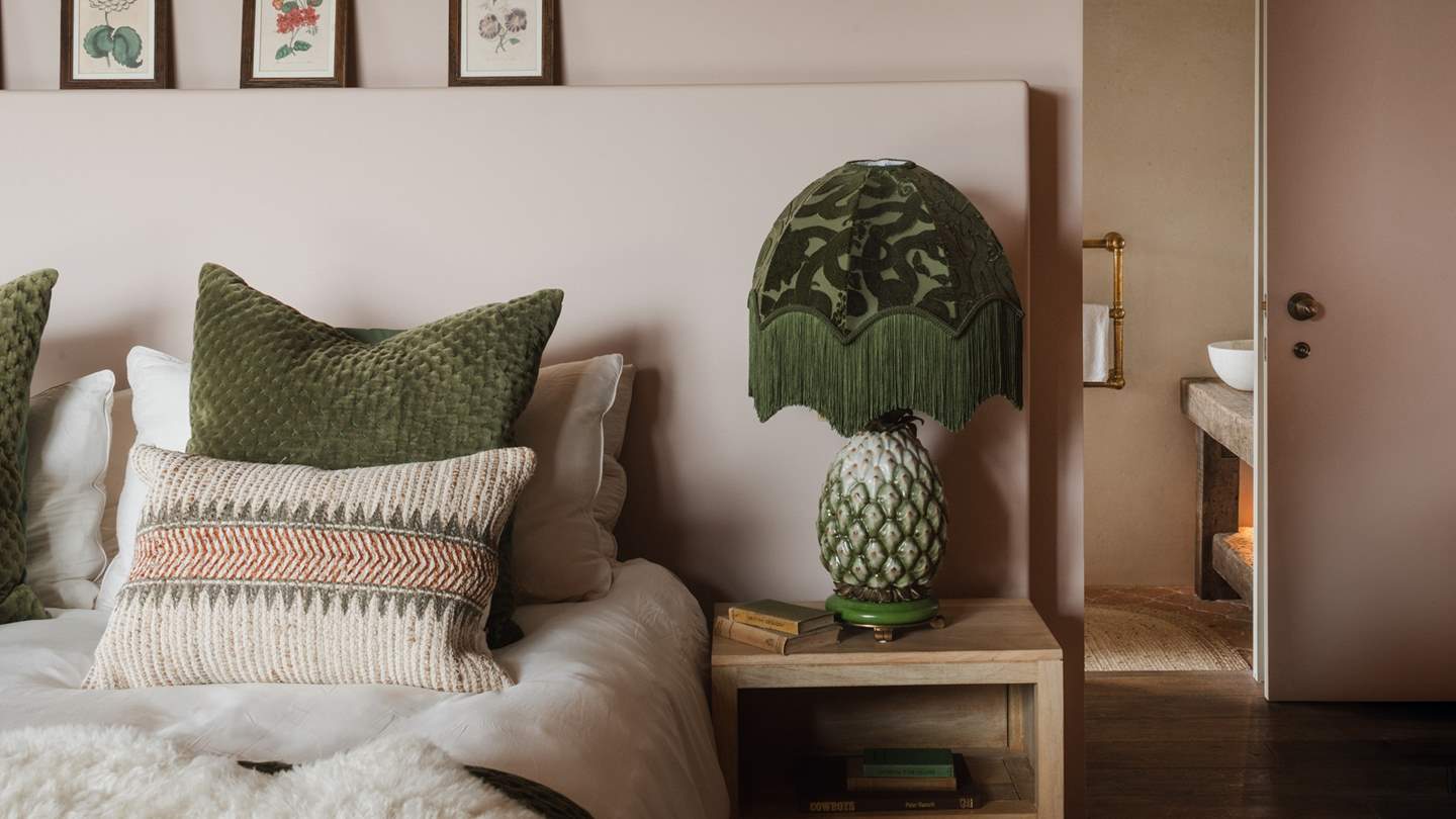 Luxury fringed lamps by House of Hackney add a whimsical element to this grown-up boudoir 