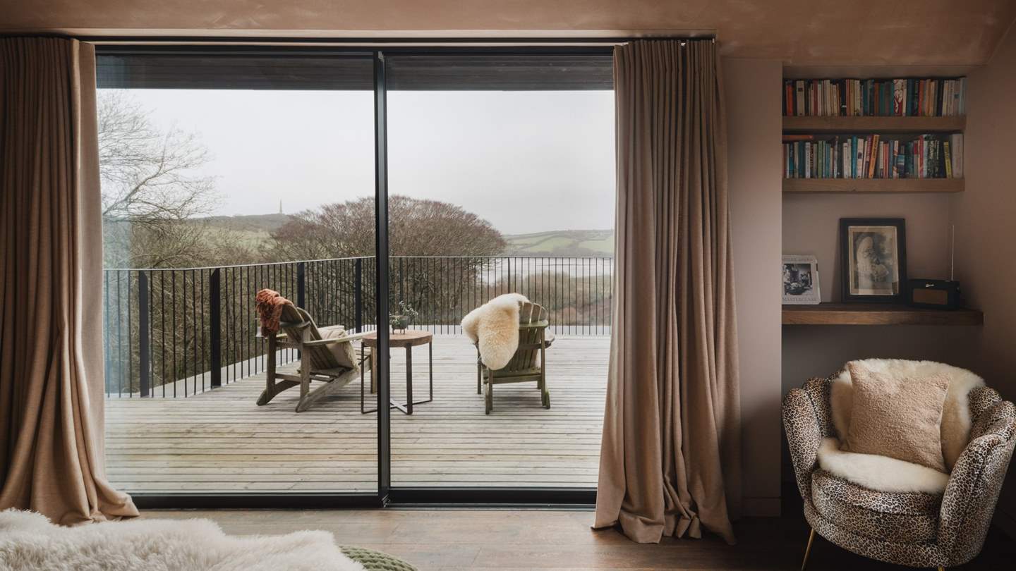 Glass sliding doors lead to the spacious deck, where you can sip early morning lattes with a view