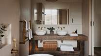 Seek serene self-care moments in the luxurious Mediterranean style en suite