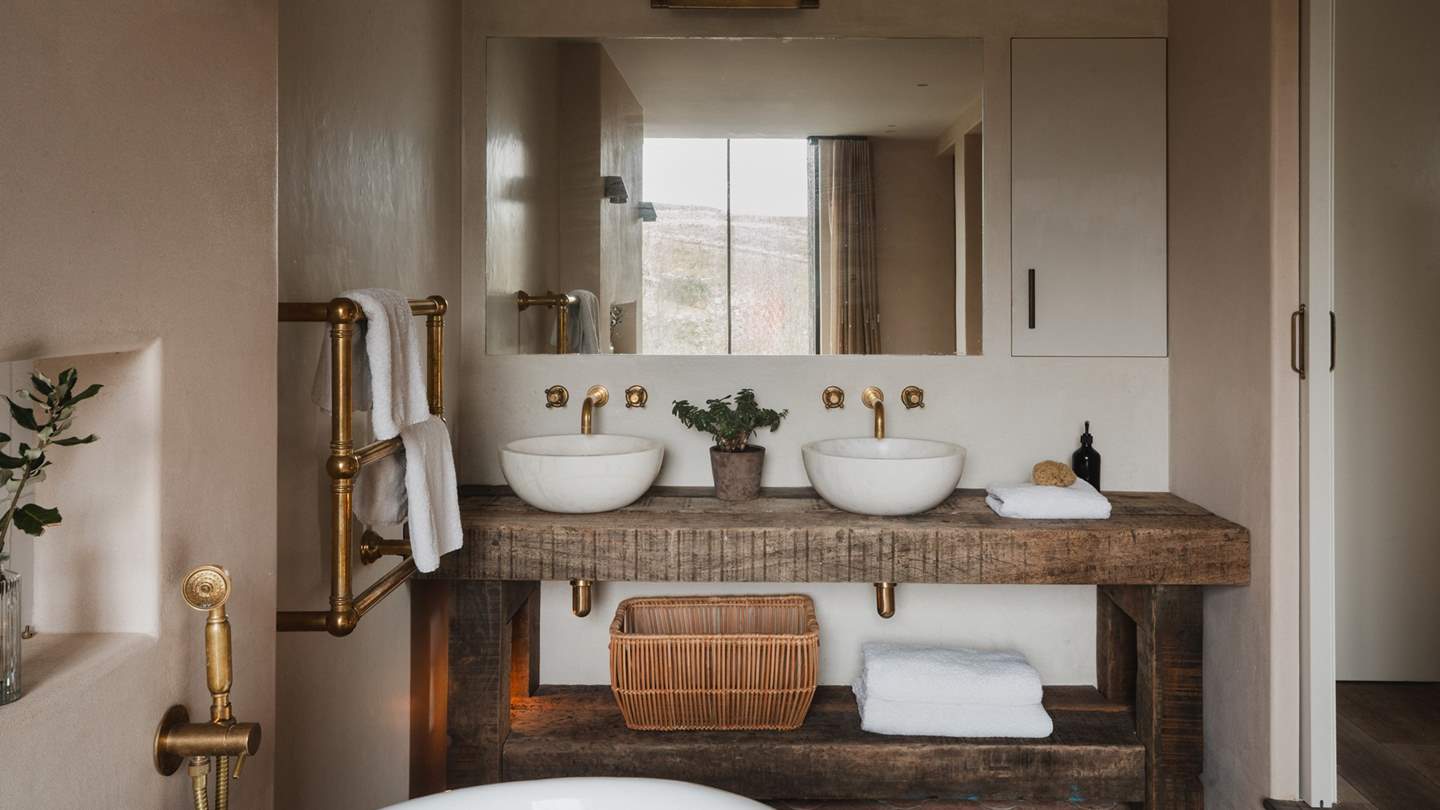 Seek serene self-care moments in the luxurious Mediterranean style en suite