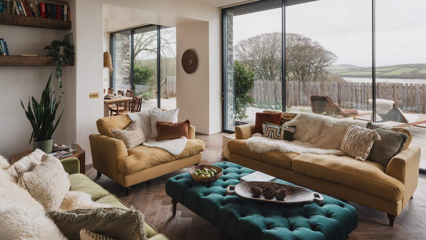 The formal living space is a wonderful space to settle for fireside conversation and cinema experiences, with a large projector and 5.1 surround sound