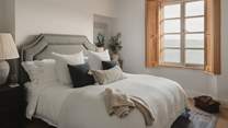 A restful space, the master bedroom beckons with a Neptune super king bed and mesmeric ocean views