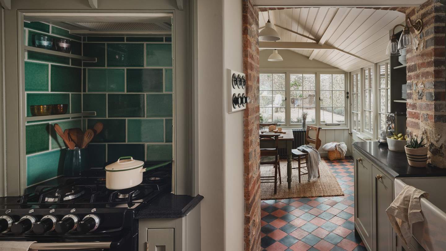 Craft delicious repasts on the sleek black, granite worktops