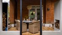 A sheltered terrace awaits beyond the patio doors
