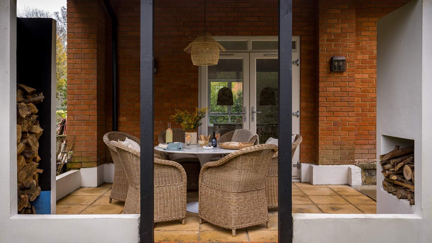 A sheltered terrace awaits beyond the patio doors