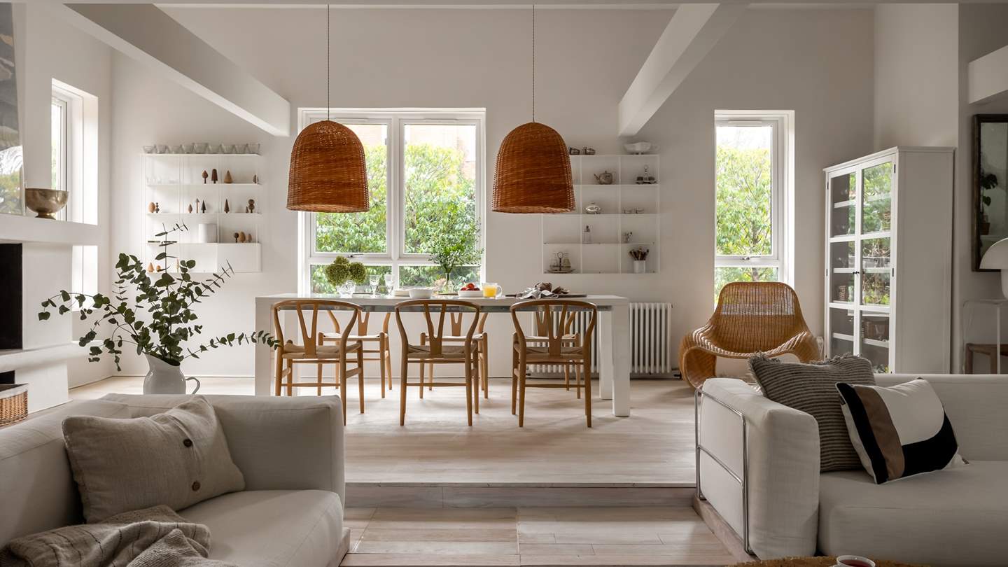 At the far side of the open-plan space, you’ll find a dining table for six