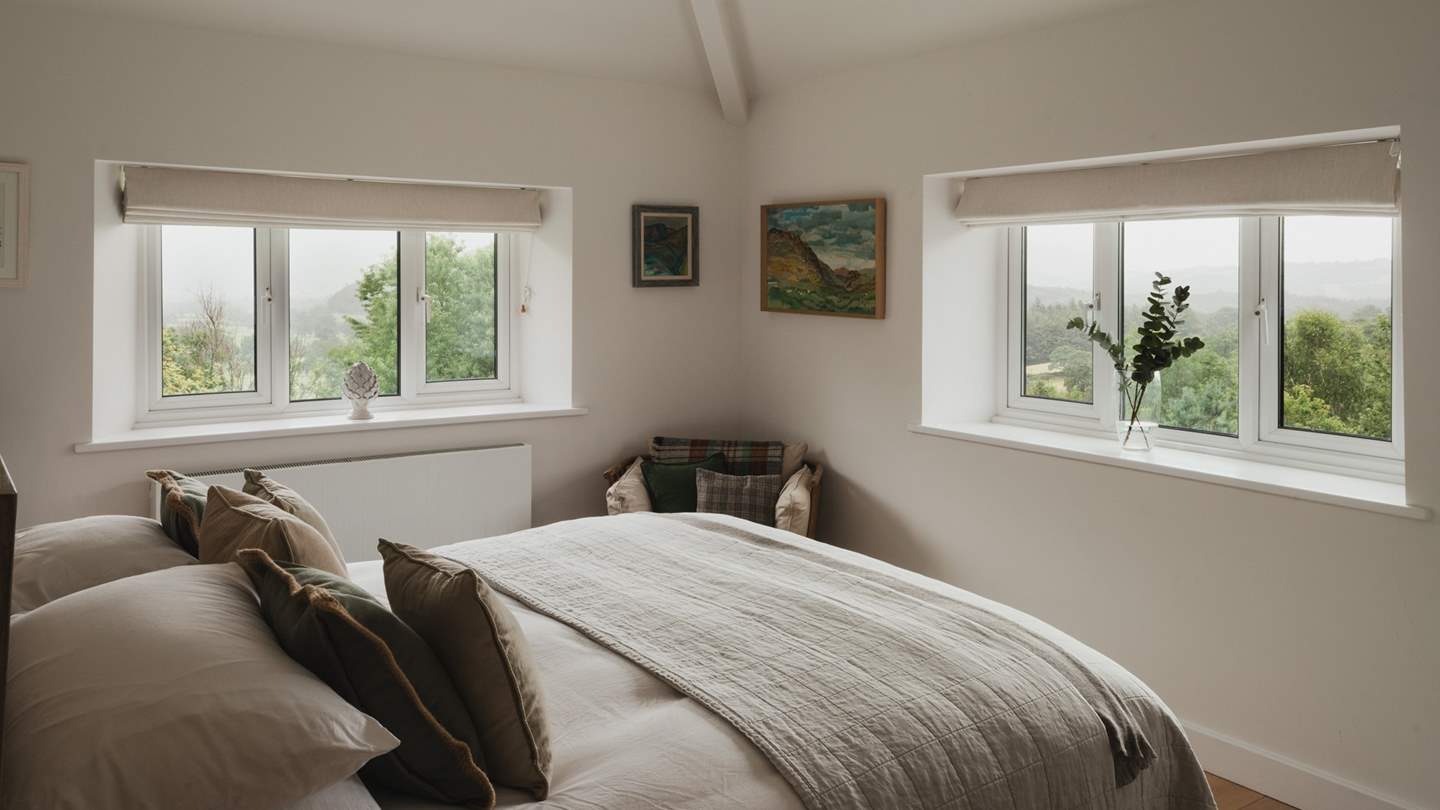 The second bedroom boasts heavenly Lakeland vistas from the dual aspect windows