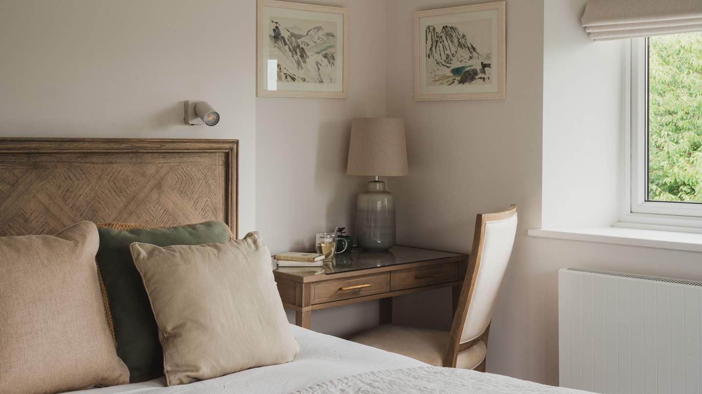 A desk and chair promise a quiet space to get ready