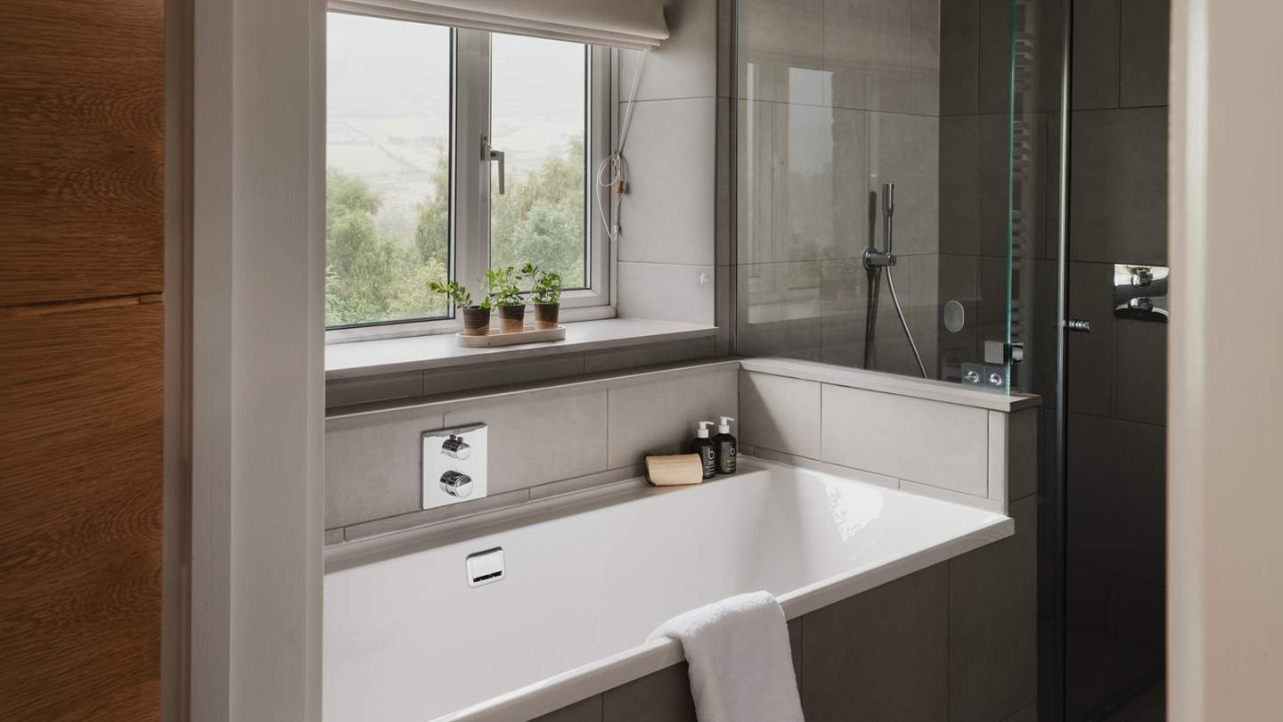 Savour bubble-topped soaks in the inviting bathtub