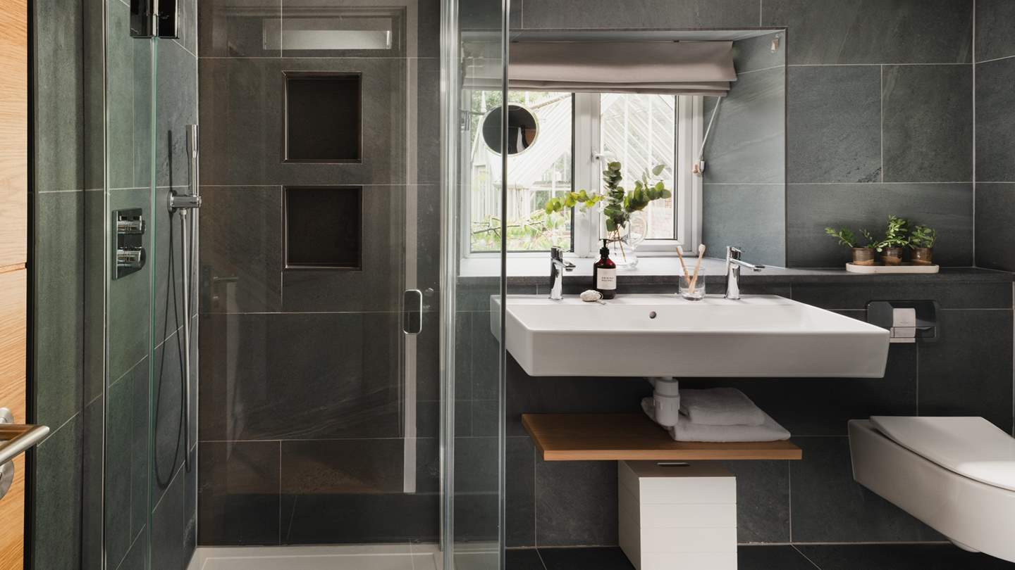 Uncover a walk-in shower, separate bath and heated towel rail to keep towels fluffy and warm