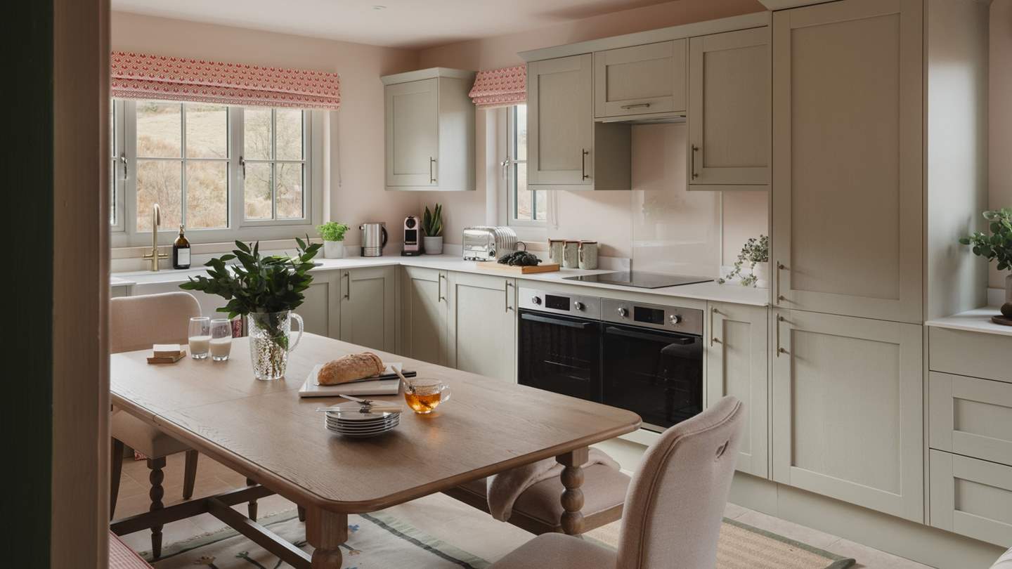The farmhouse style kitchen is a dream for preparing meals and dining with family and friends