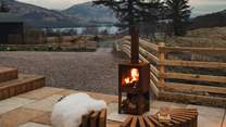 After sundown, rest beside the outdoor wood burning stove