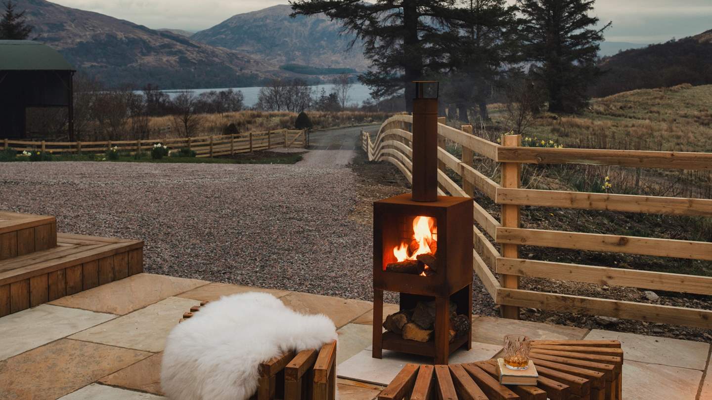 After sundown, rest beside the outdoor wood burning stove