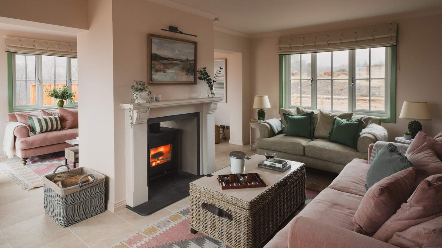 Promising a beautiful balance of plugged and un-plugged entertainment, uncover two living spaces either side of the dual aspect wood burning stove