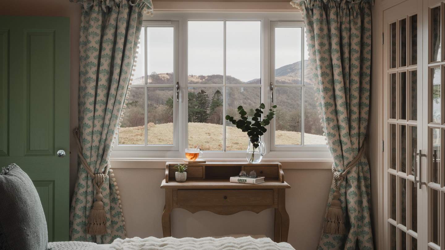 A dressing table nestles beneath the sash windows of the first bedroom, promising inspiring vistas of rolling Scottish hills