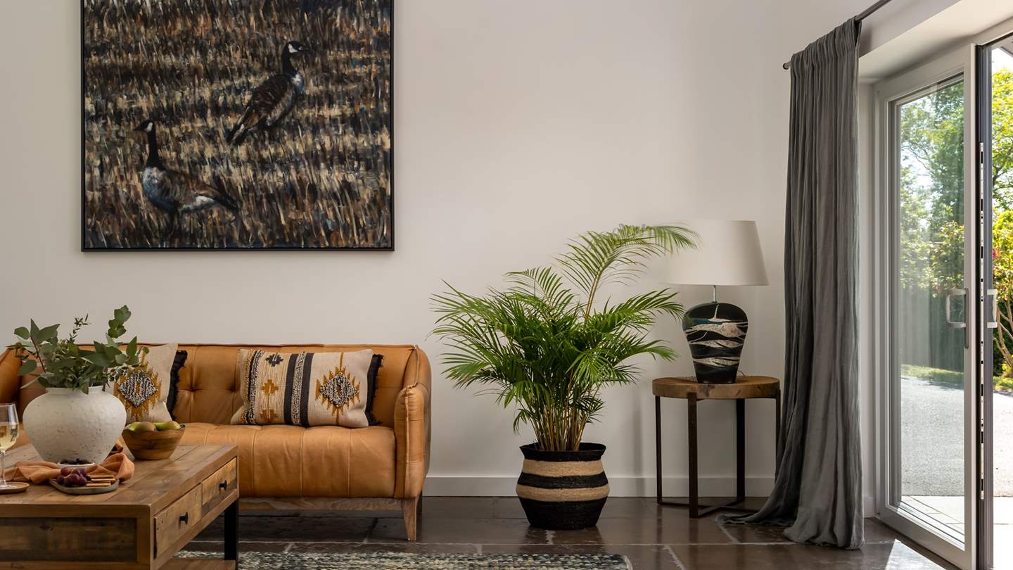 Rustic interior touches and original artwork promise a serene spot to reside