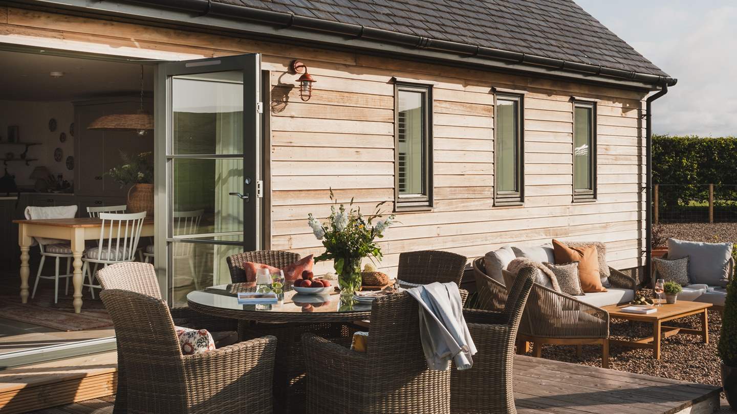 Serene scenes await outside, with plentiful space to relish the best of outdoor living in the enclosed garden