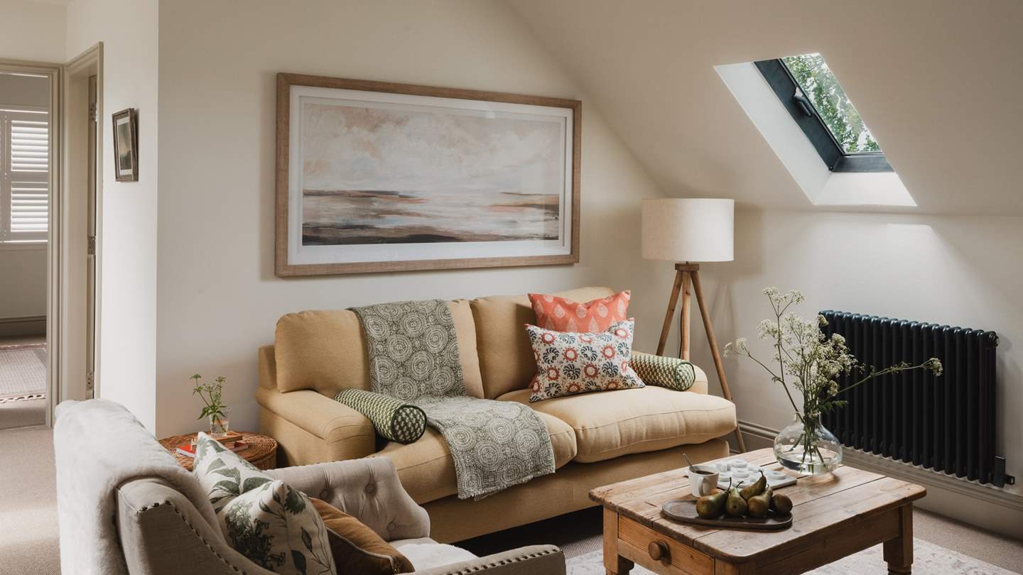 Uncover a cosy snug with seating for three on the first floor