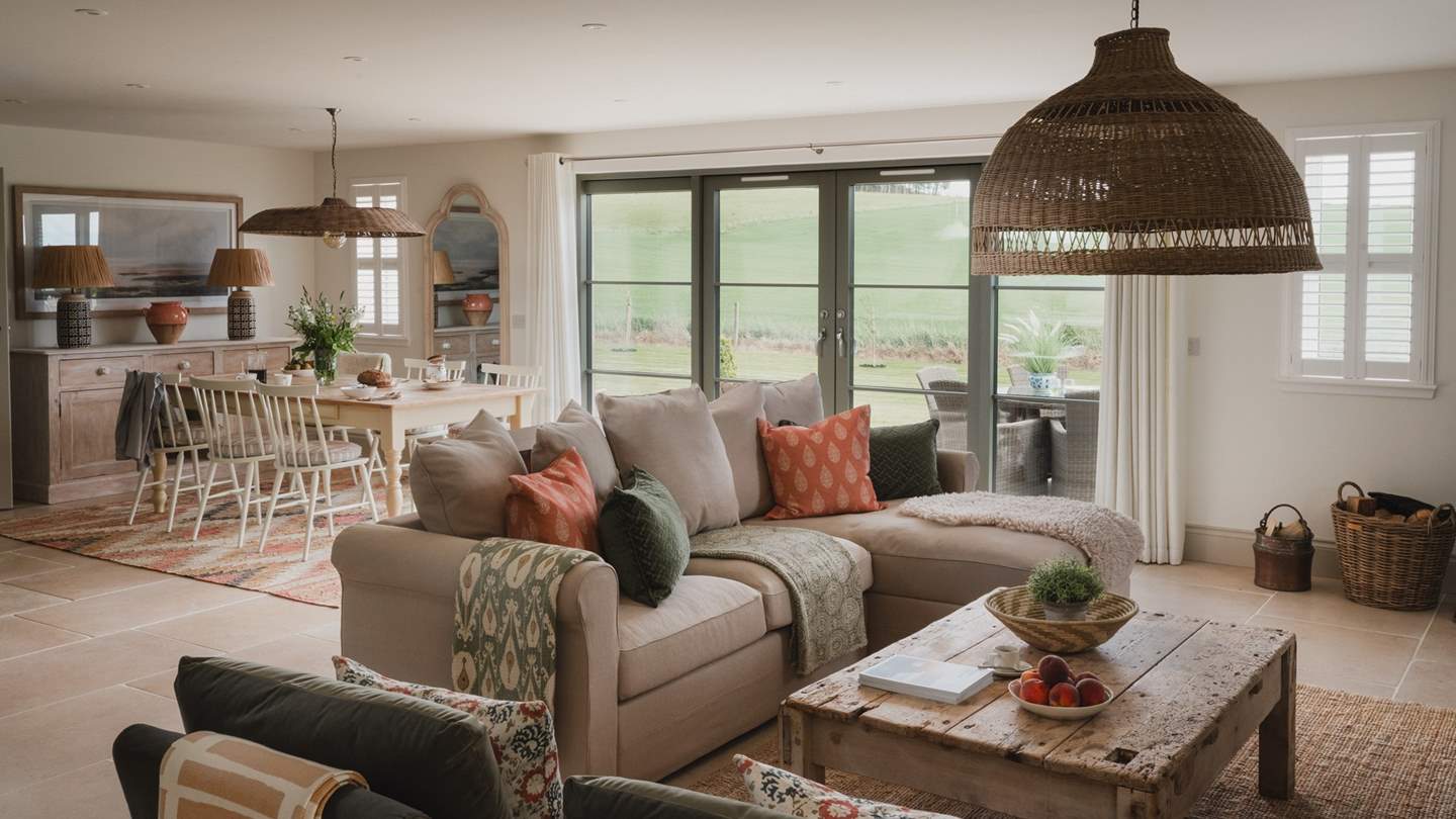 Calming contemporary interiors blend beautifully with vintage touches at our luxury open-plan converted barn