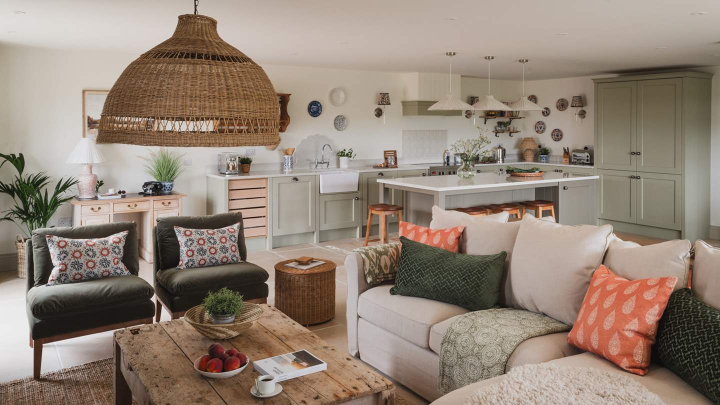 The living, kitchen and dining area invites for the dreamiest country escapes