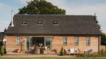 Luxury living awaits at our country-inspired converted barn 