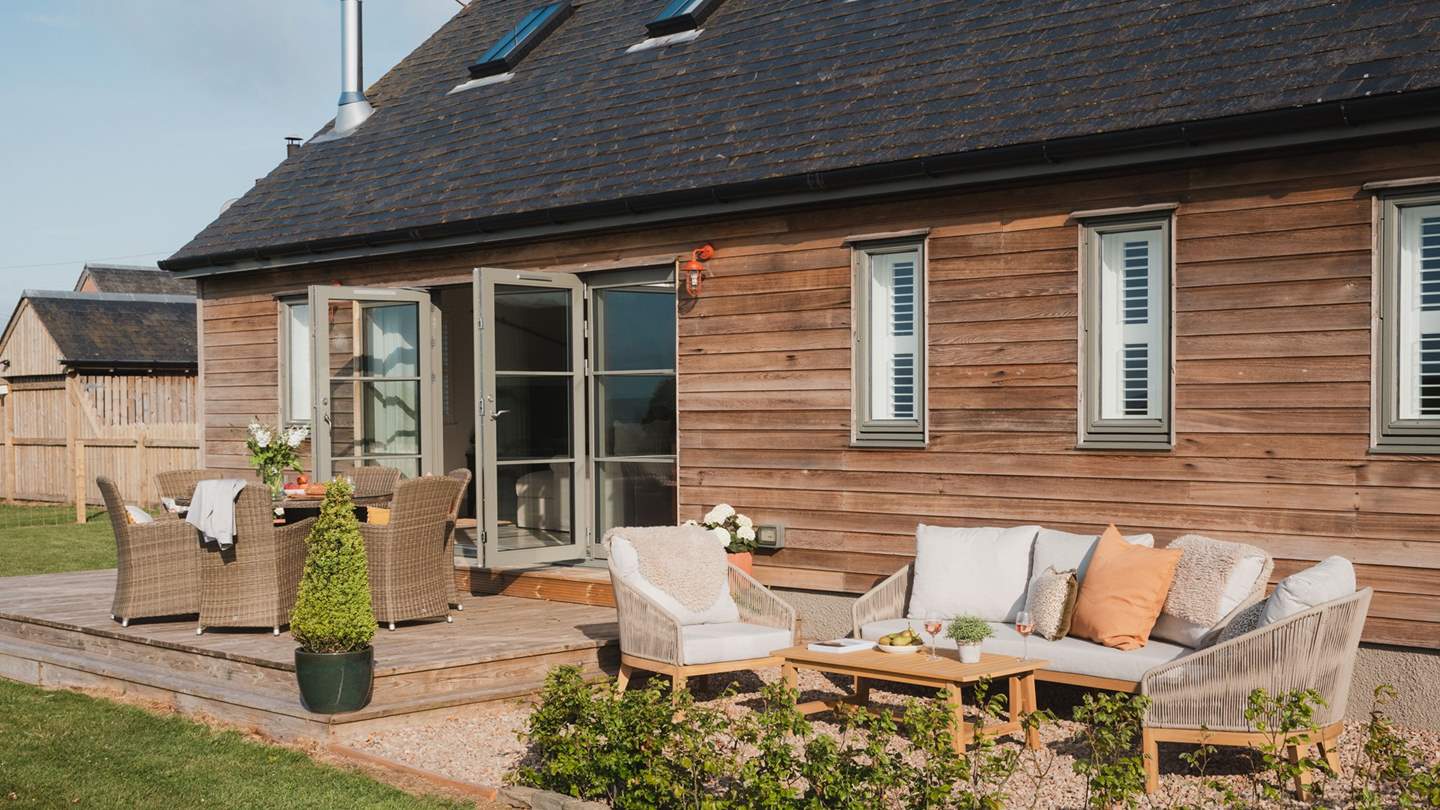 For laid-back outdoor living, a chic lounge set awaits, 