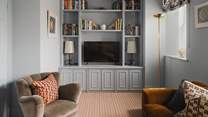 Set within bespoke alcoves is the Smart TV