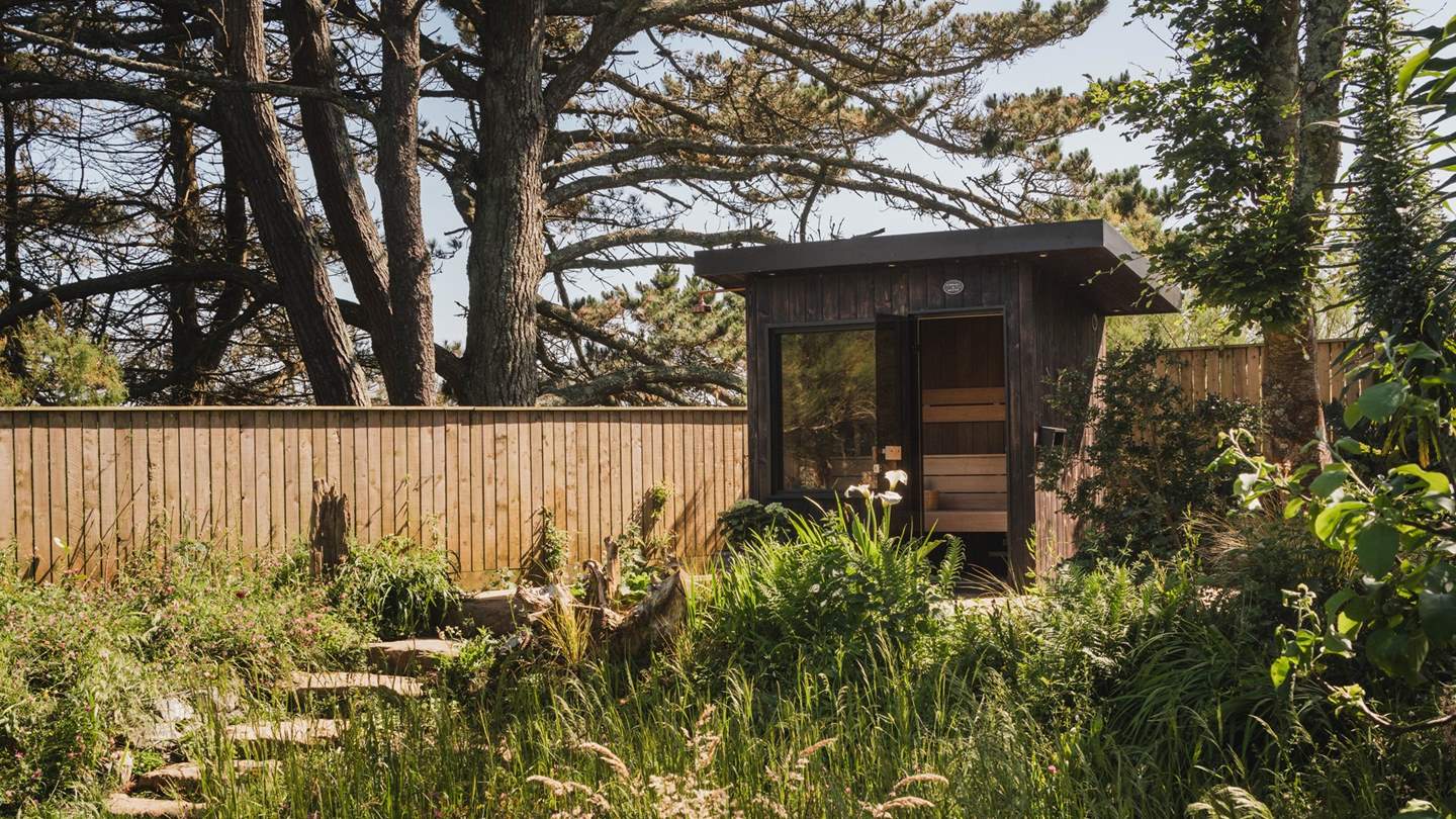 Reset your life balance in the wood-clad sauna, shaded by swaying trees