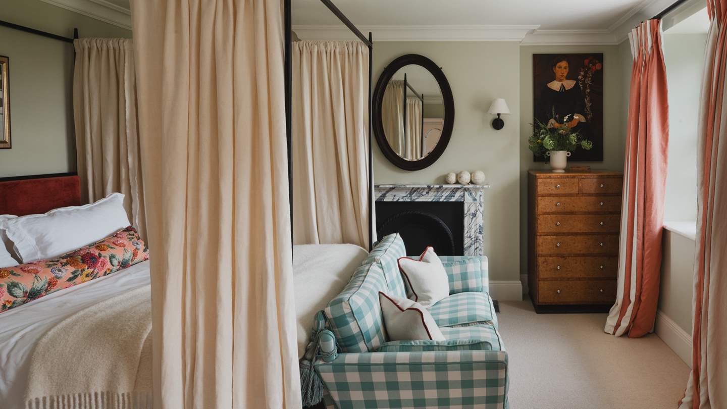 A sweet gingham sofa offers a tempting reading nook