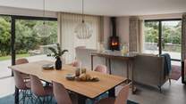 Nestled between the kitchen and living area is the dining space, where you’ll find a stylish Conran table for eight 