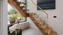 Follow the stairs to uncover three equally calming bedrooms...