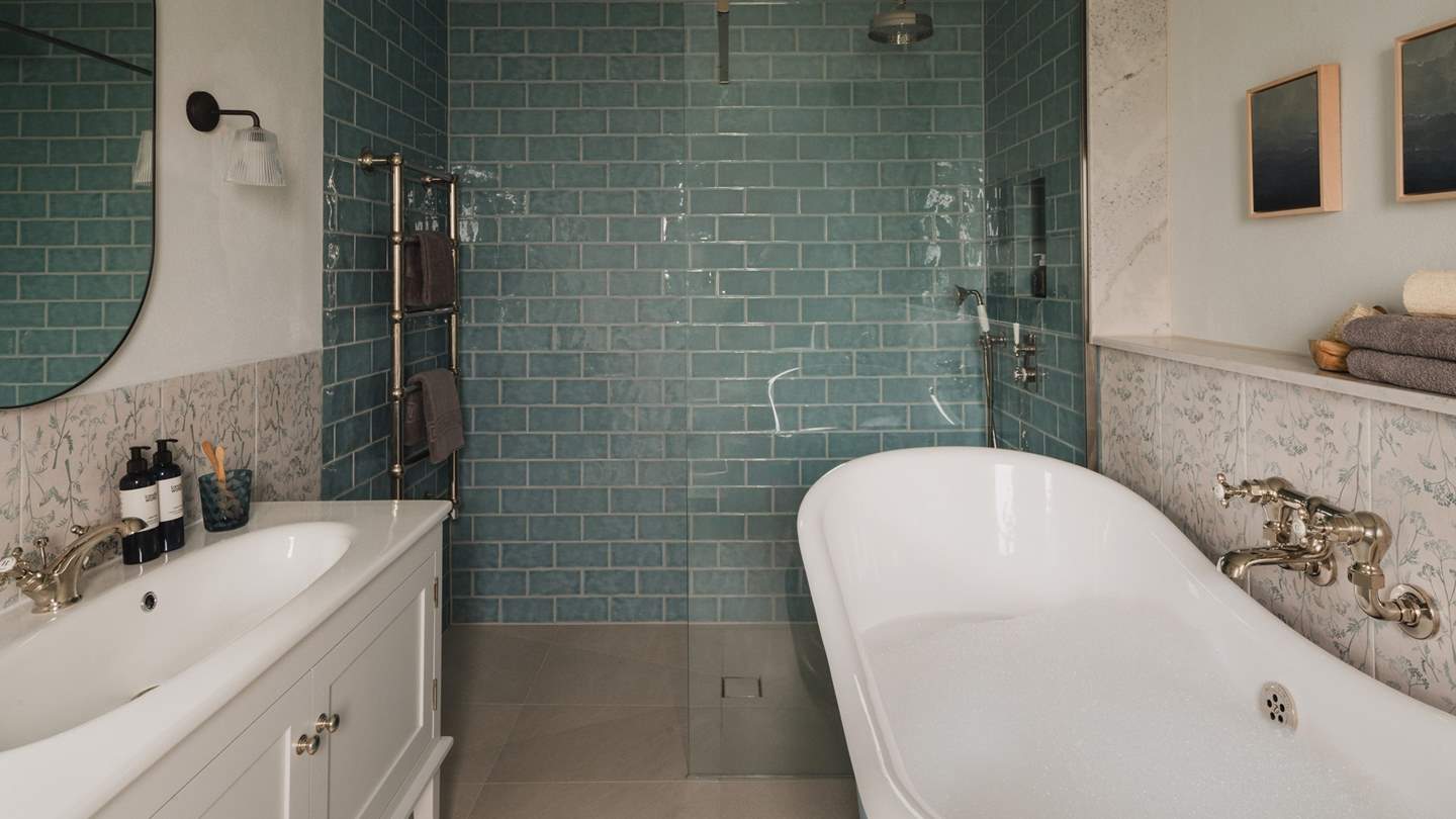 There is also a seperate walk-in shower with a rainfall head