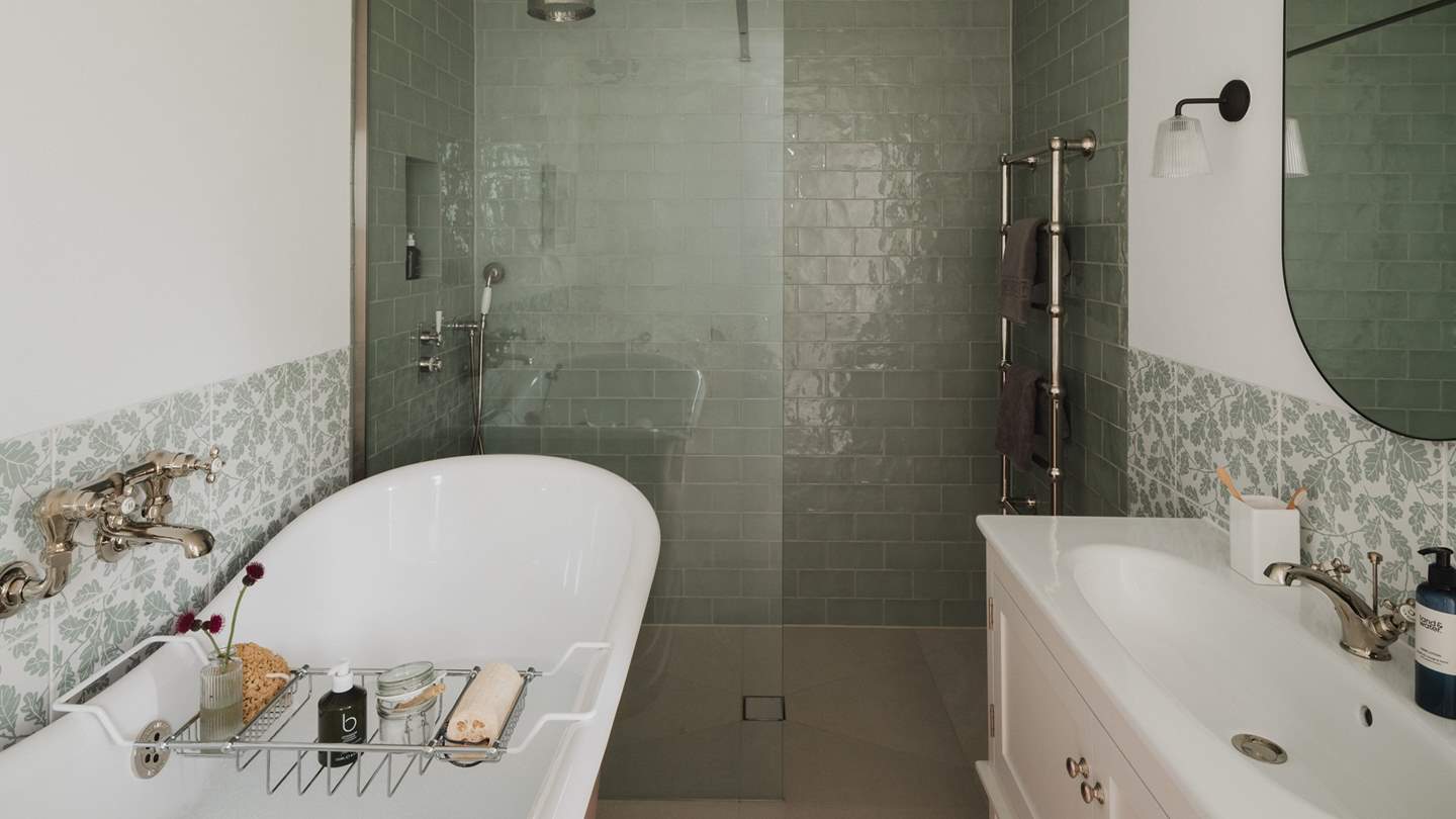 A walk-in rainfall shower ensures rejuvenating wake ups