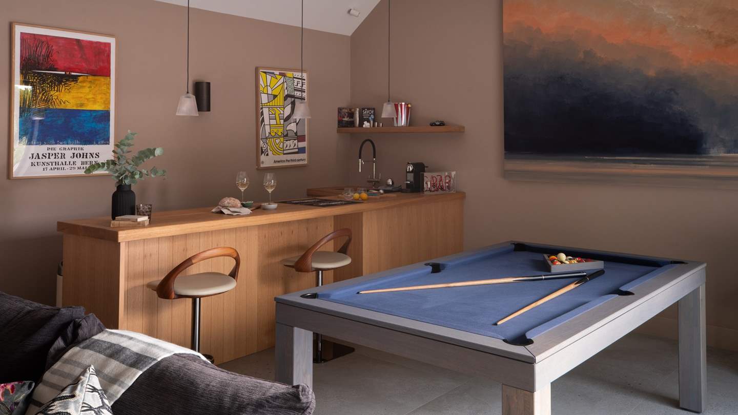 Endless family fun resides in the games room - whether you're crafting tipples at the bar or indulging in light-hearted competition around the pool table