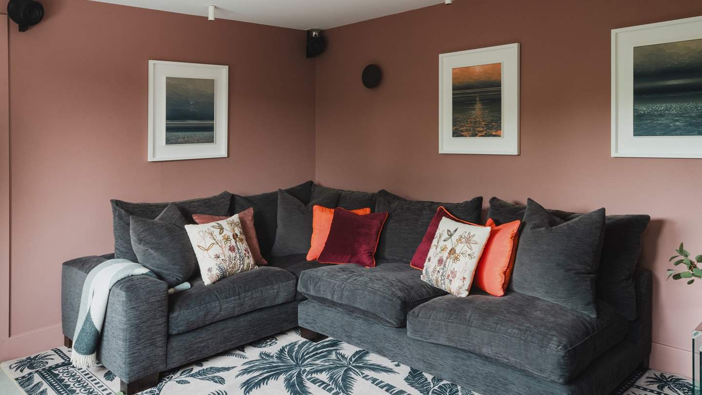 Vibrant furnishings, calming artwork and rich-toned walls create a cocoon in which to retreat