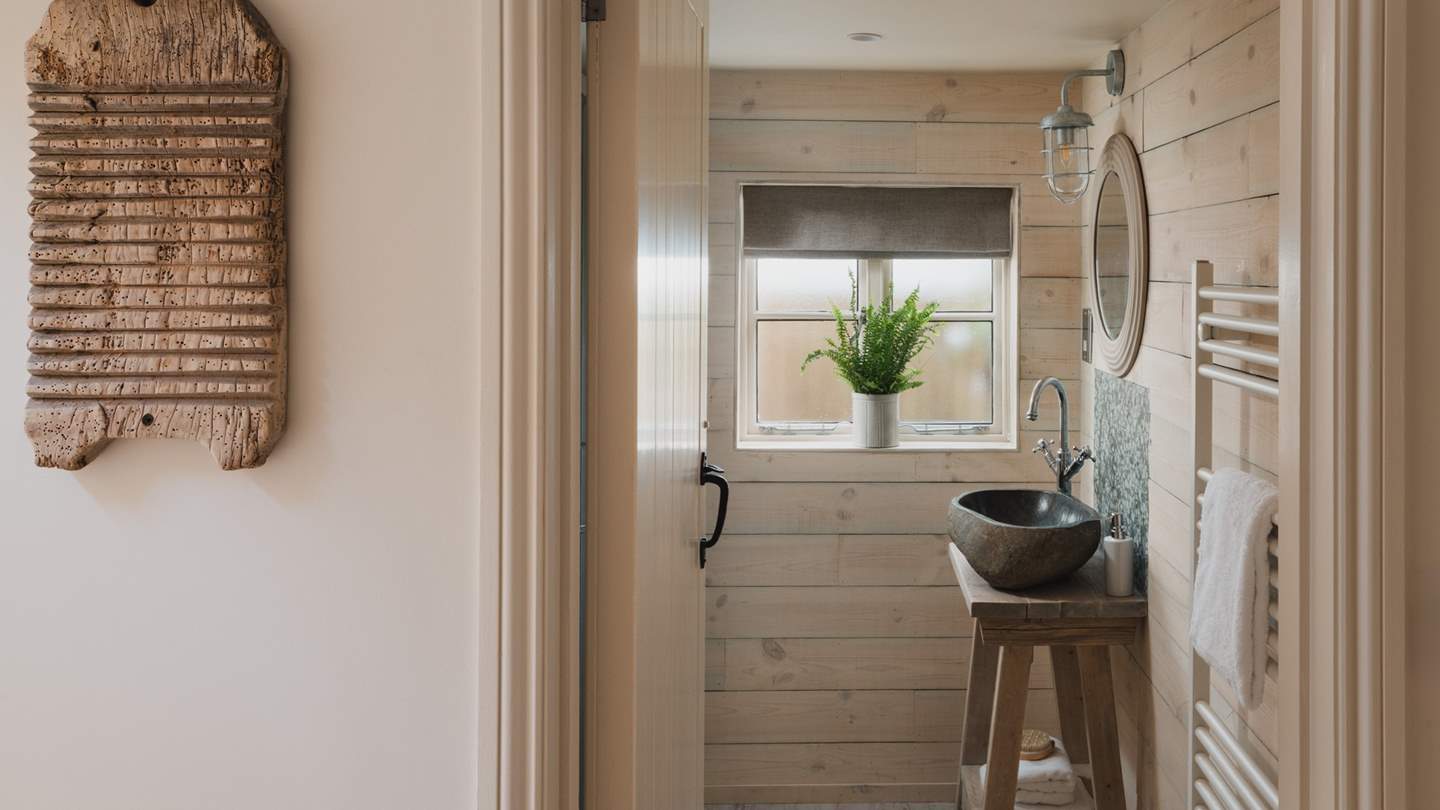 On the ground floor, the sweet shower room awaits