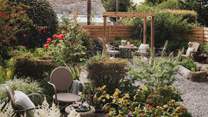Soak up the beauty of the garden from the bistro table