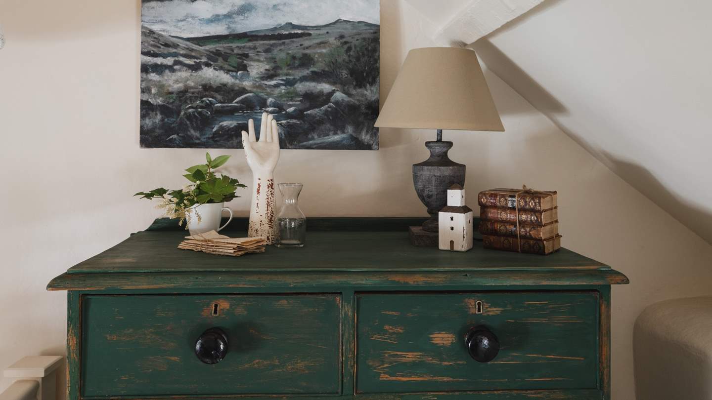 For storing belongings, a large dresser awaits
