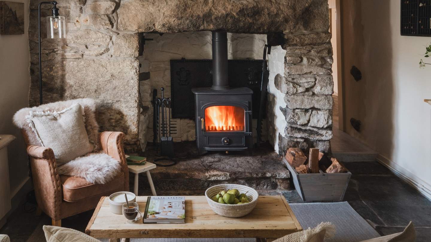 Relax beside the fire from the sheepskin armchair, watching your favourite series on the Smart TV