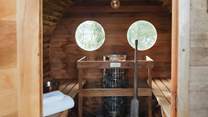 Retreat to the heavenly sauna, where rejuvenating moments reside