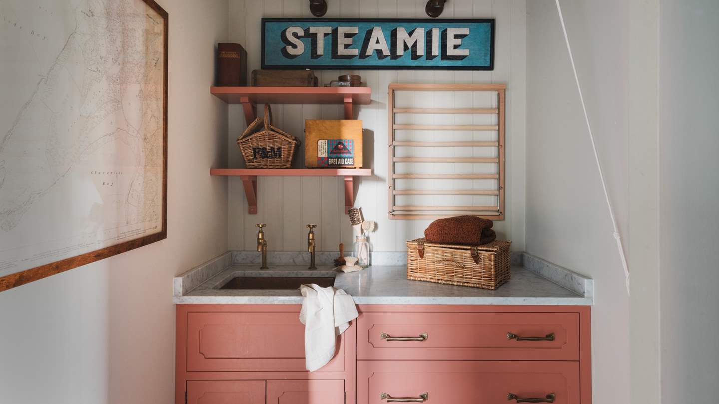 In the separate utility, you’ll find the washing machine and tumble dryer