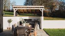 An outdoor kitchen space awaits for barbequing summertime favourites on the Gas Grill Master