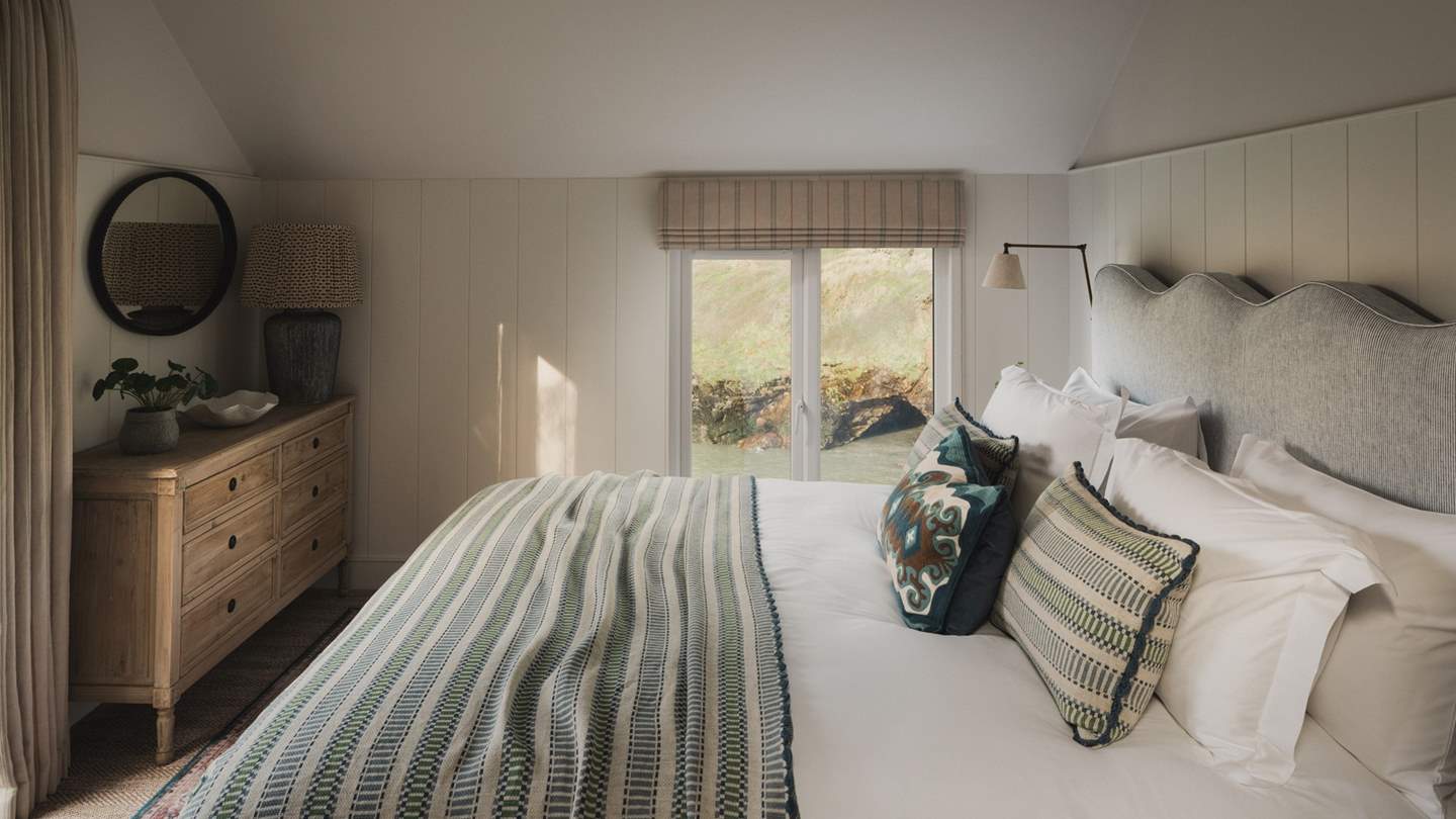 Luxurious living spaces and three beautiful bedrooms beckon