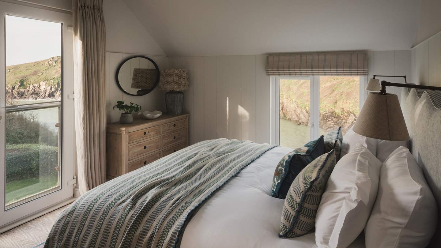 The second bedroom offers uninterrupted views to savour at the start and end of each day 