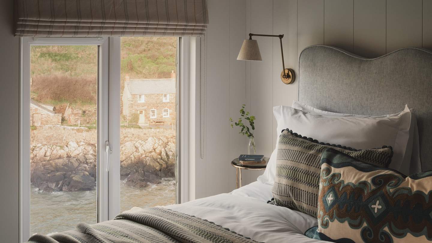 The sumptuous bed is topped with the softest pillows and throws