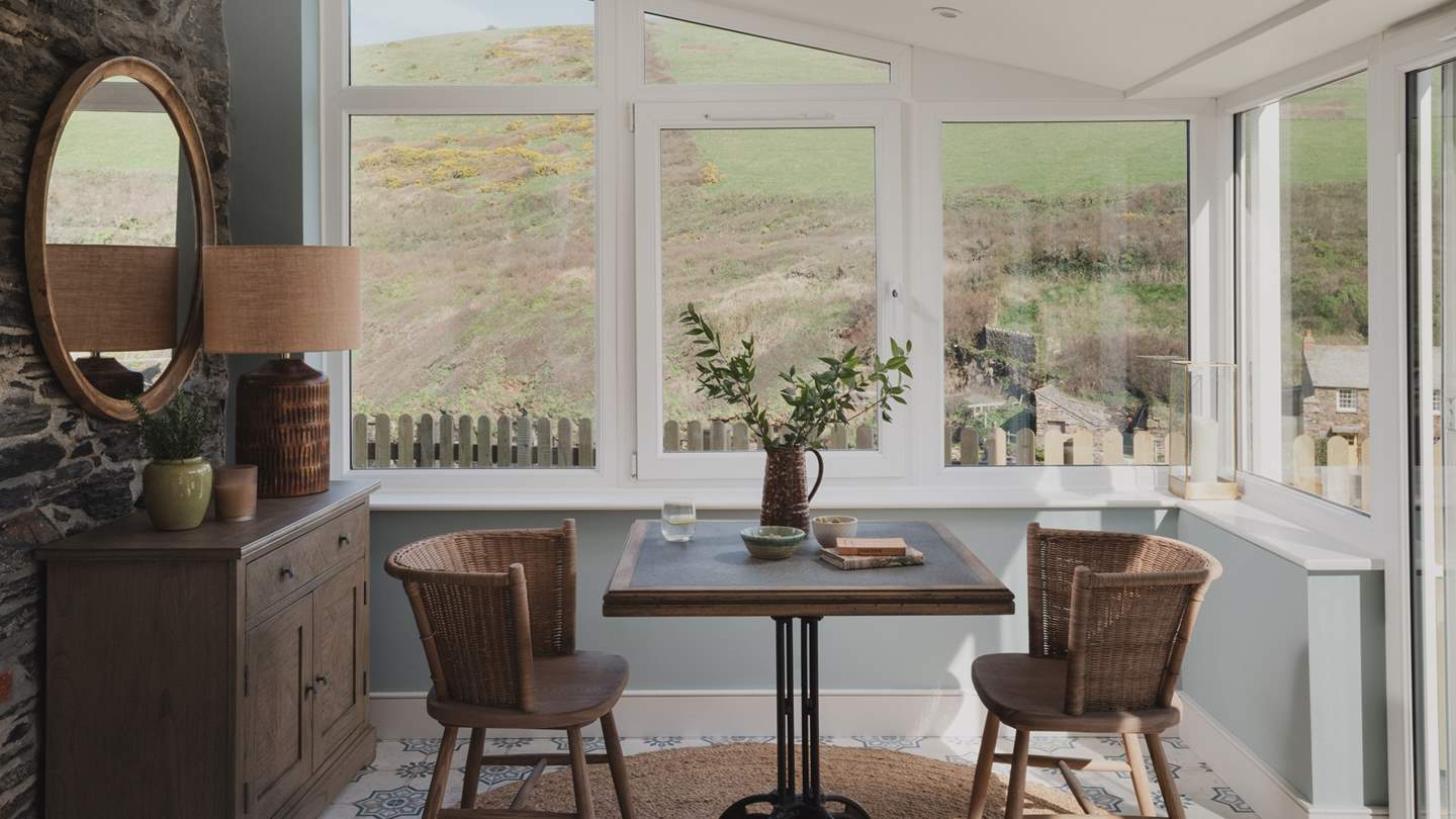 Take a seat in one of the OKA armchairs in handwoven dhurrie print or rattan dining chairs