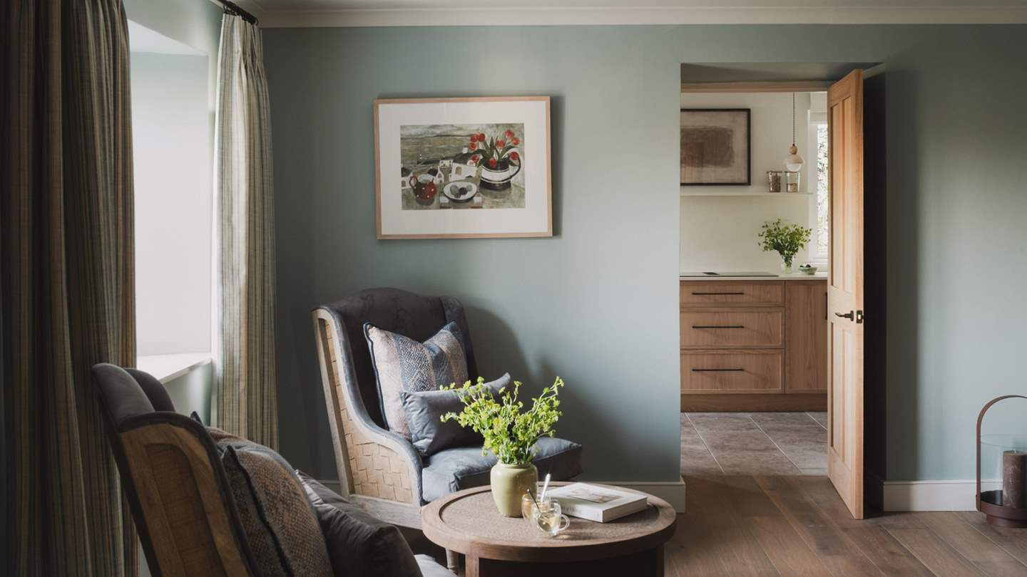 Relish hushed moments in the relaxed seating area 