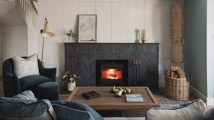 Thoughtfully designed by Nicola O’Mara, the heavenly living area takes inspiration from the ocean hues beyond the window, bathed in nautical tones and a calming palette