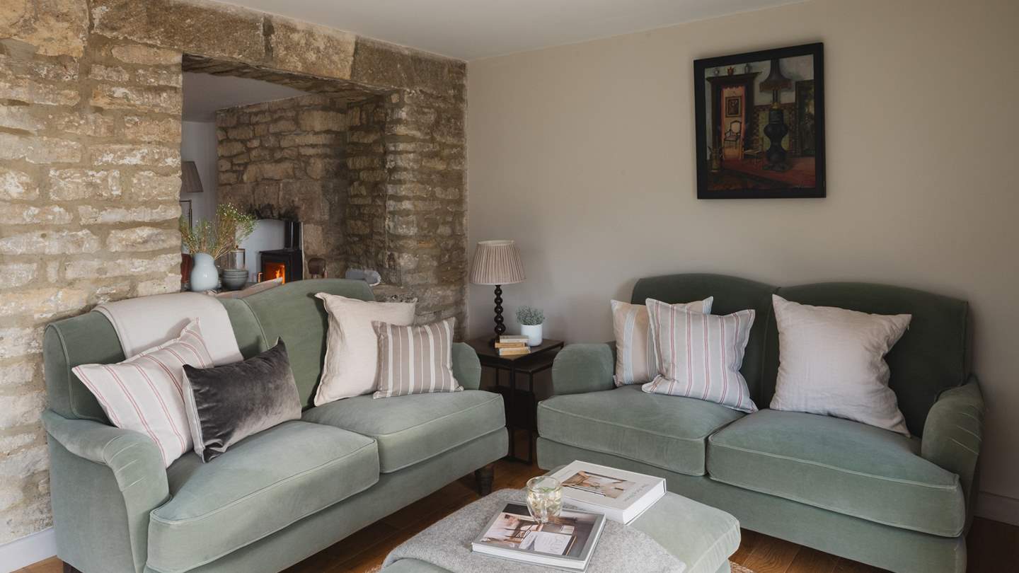 Admire country vistas from one of the two plump sofas in this elegant living area