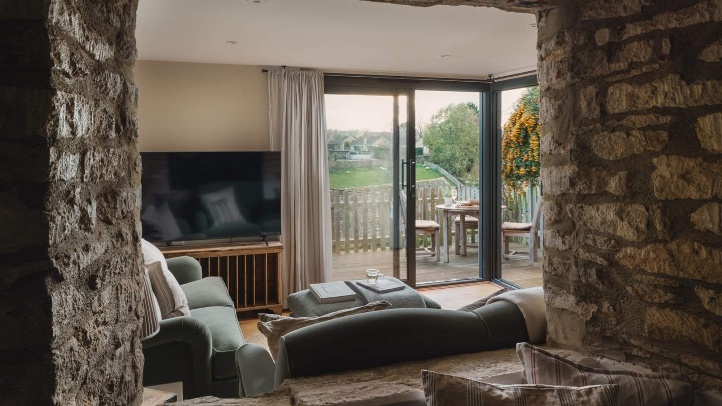 The beautiful lounge bathed in calming hues offers bewitching views through floor-to-ceiling windows